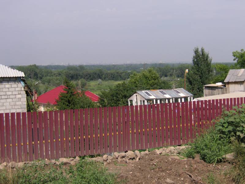 Современный вид на низину Кривуши от забора дачного массива в районе платформы "Молодежная"